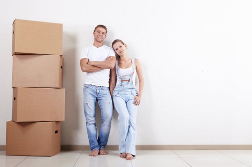 Professional flat removals in Elephant and Castle with moving van outside an apartment block