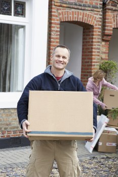 Packed office equipment and labelled crates prepared for business relocation in Elephant and Castle