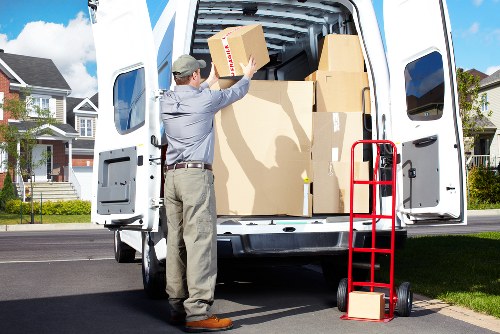 Furniture and boxes being loaded into a moving van in Elephant and Castle