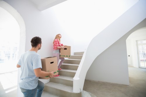 Removal team packing and loading boxes for a flat move in Elephant and Castle
